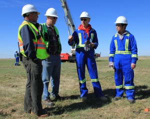 (From left) Kirk Osadetz, CaMI Programs Development Manager; Don Lawton, CaMI Director; Dave Eaton, Geoscience Professor; and Xeuwei Bao, postdoctoral researcher, at field research station